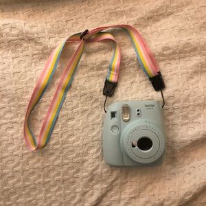 Insta x mini Polaroid camera light blue with strap